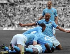 IM体育-鏖战雅典之夜，阿坎吉一锤定音，曼城险胜塞维利亚锁定头名