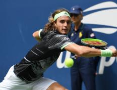 IM体育App下载-包含德国网球队横扫日本网球队，西西帕斯高光表现的词条